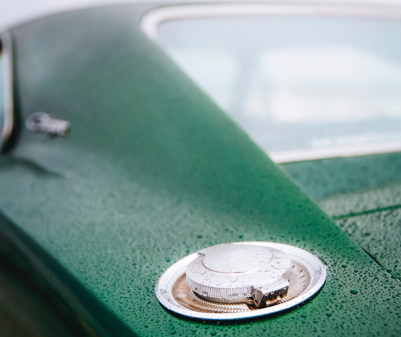 Fuel Cap on a Green Car